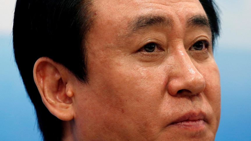 Founder of China property giant Evergrande pleads guilty to fraud