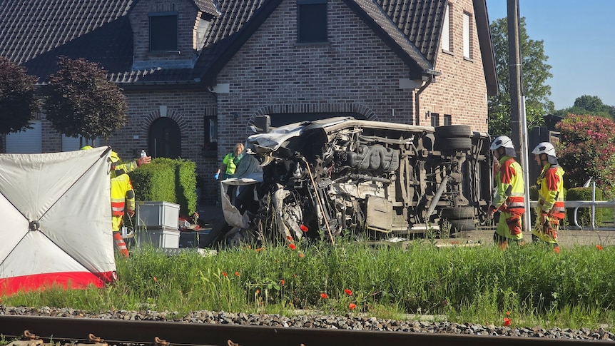 Four dead, including two children, after train hits Belgian school bus