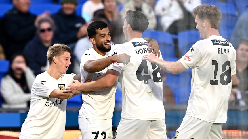 Newcastle Jets crowned A-League premiers with help from arch rivals