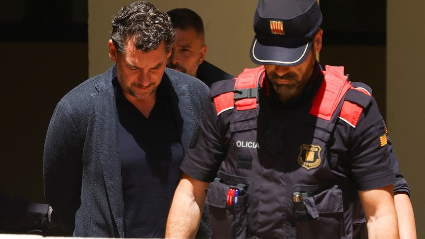 Son arrested in Spain over billionaire fashion tycoon father's deadly 100m cliff fall