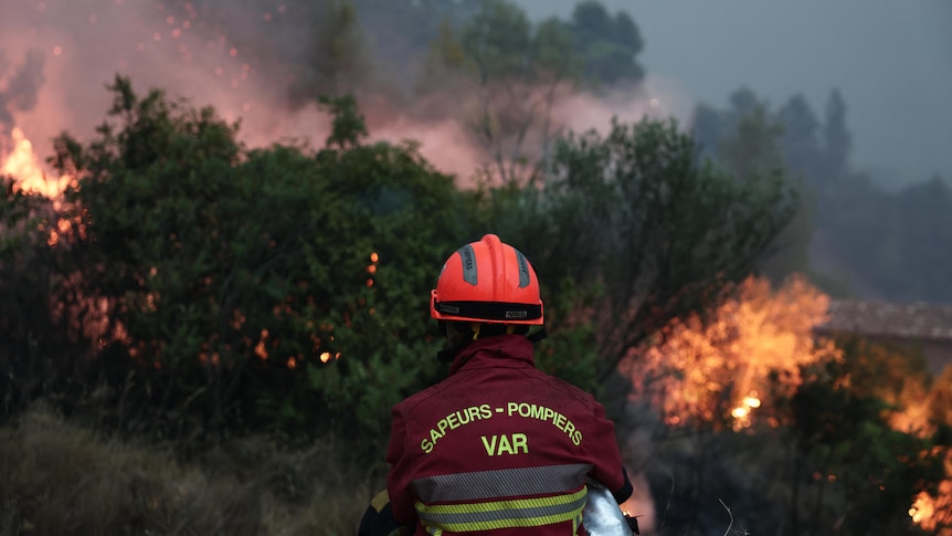 Wildfires force mass evacuations in Europe as Australia sends help