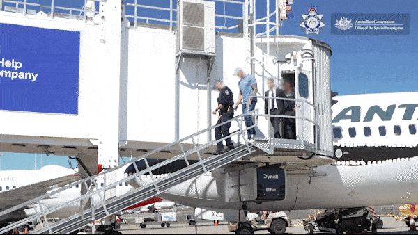 Witnesses describe moment decorated soldier was arrested at busy airport